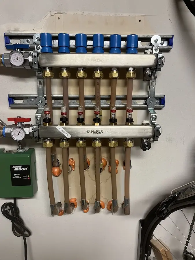 Plumber performing Water Heater Repair at a residential property in Haverford